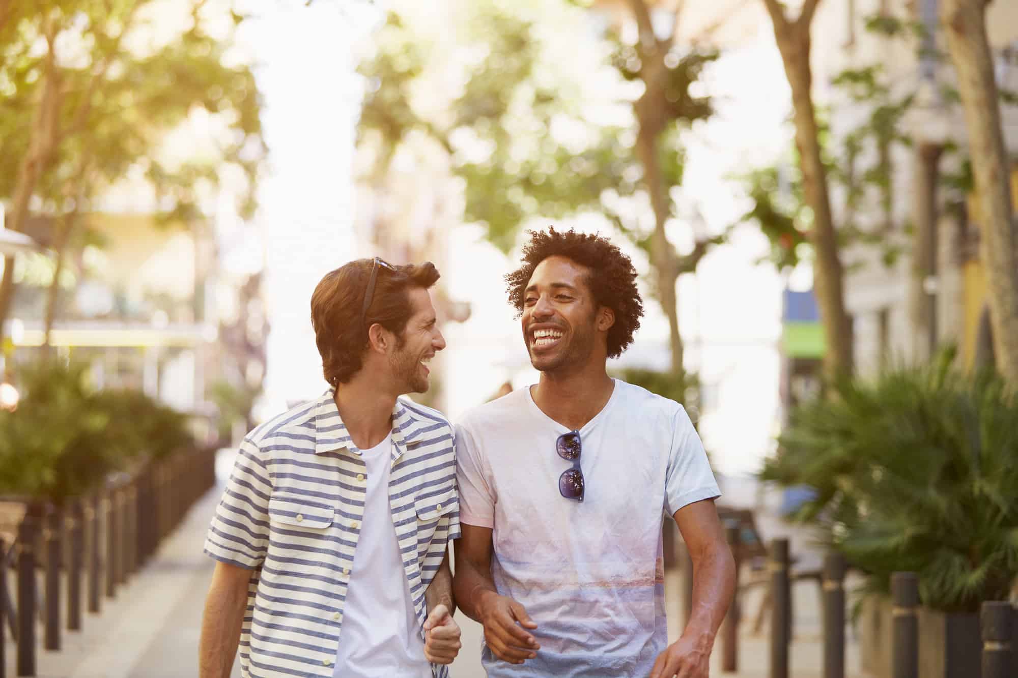 Male friends walking outdoors